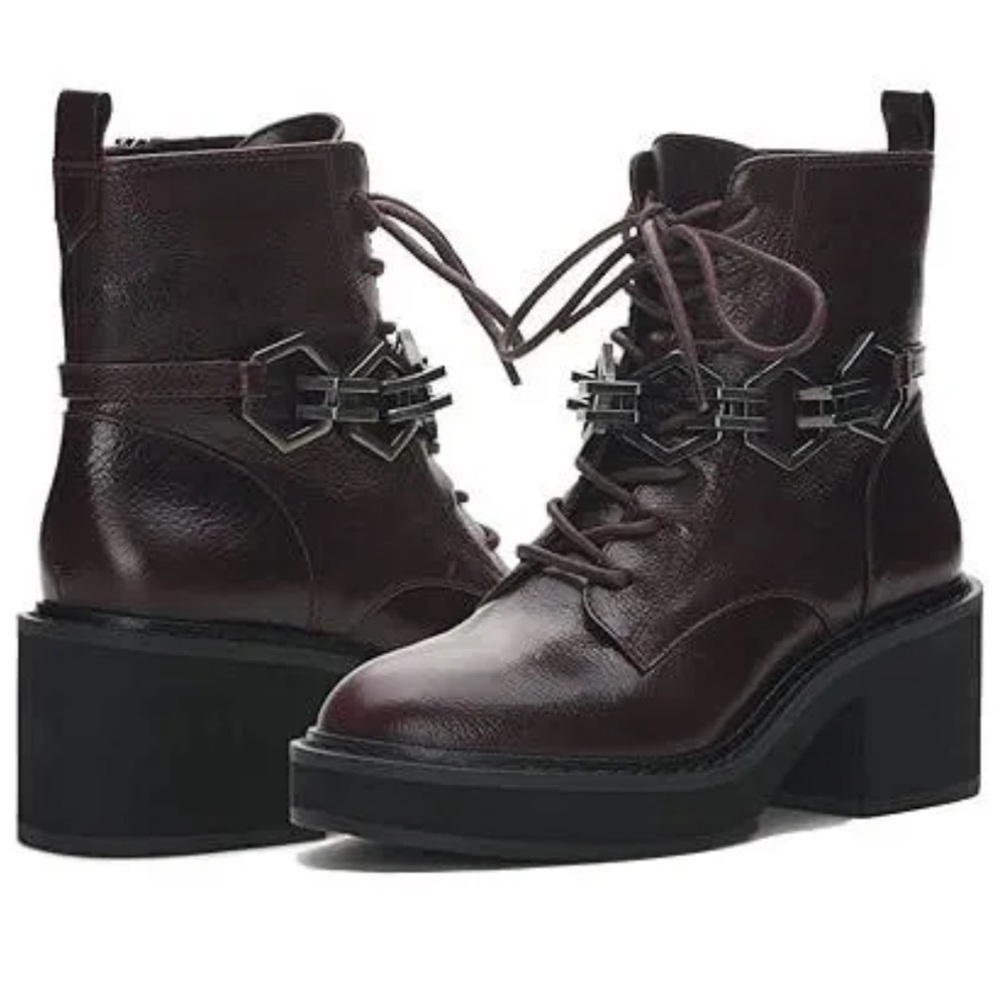 Vince Camuto, ankle boots with metallic chain detail, inside of the leg zipper.
